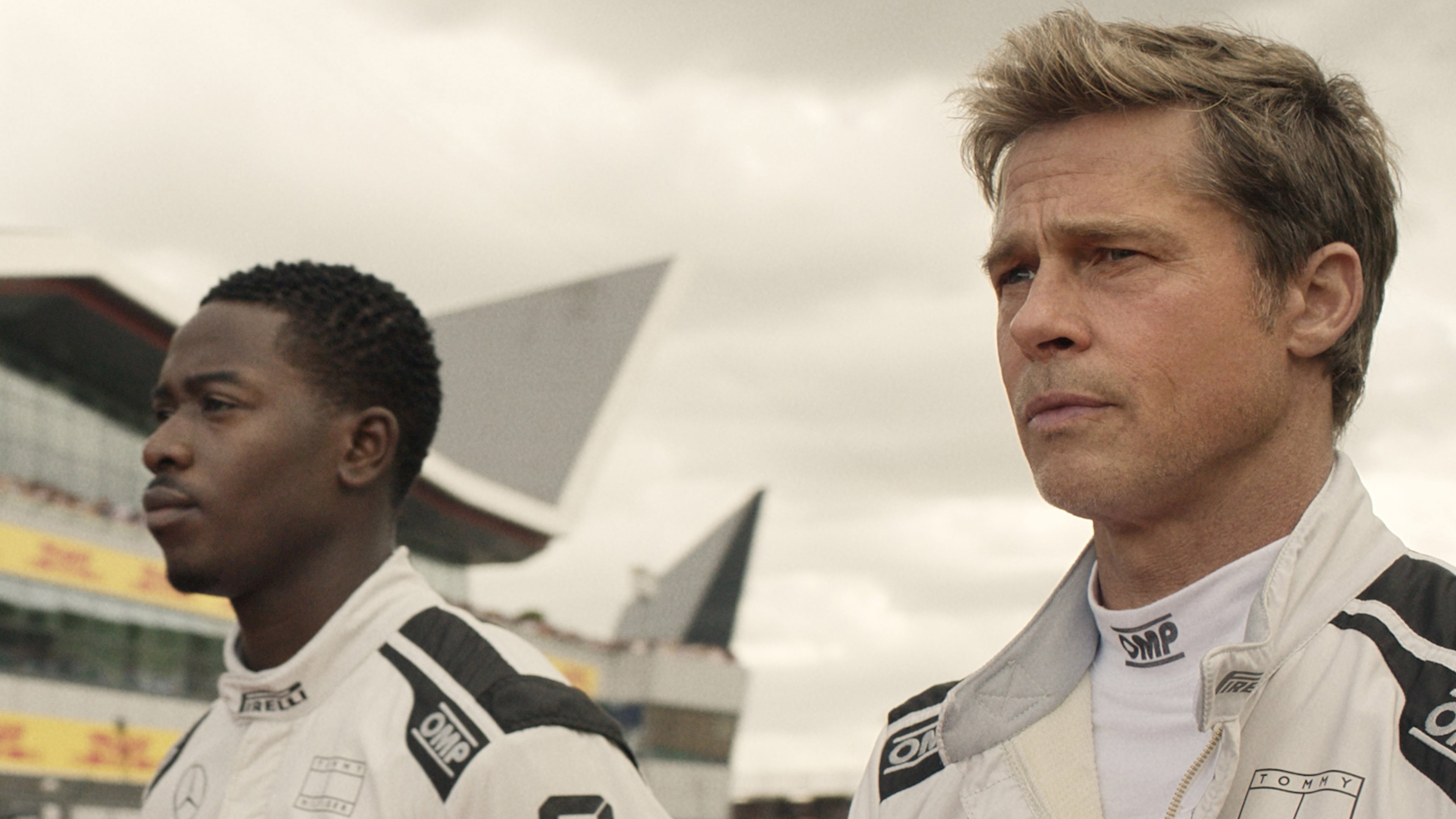 Damson Idris as Joshua Pearce and Brad Pitt as Sonny Hayes in Apple Original Films’ "F1 The Movie."