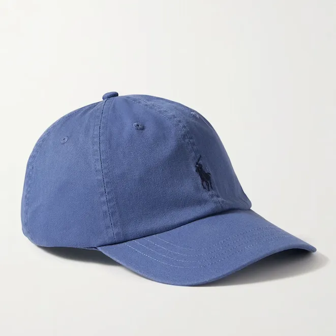 Blue Ralph Lauren baseball hat against an off-white background 