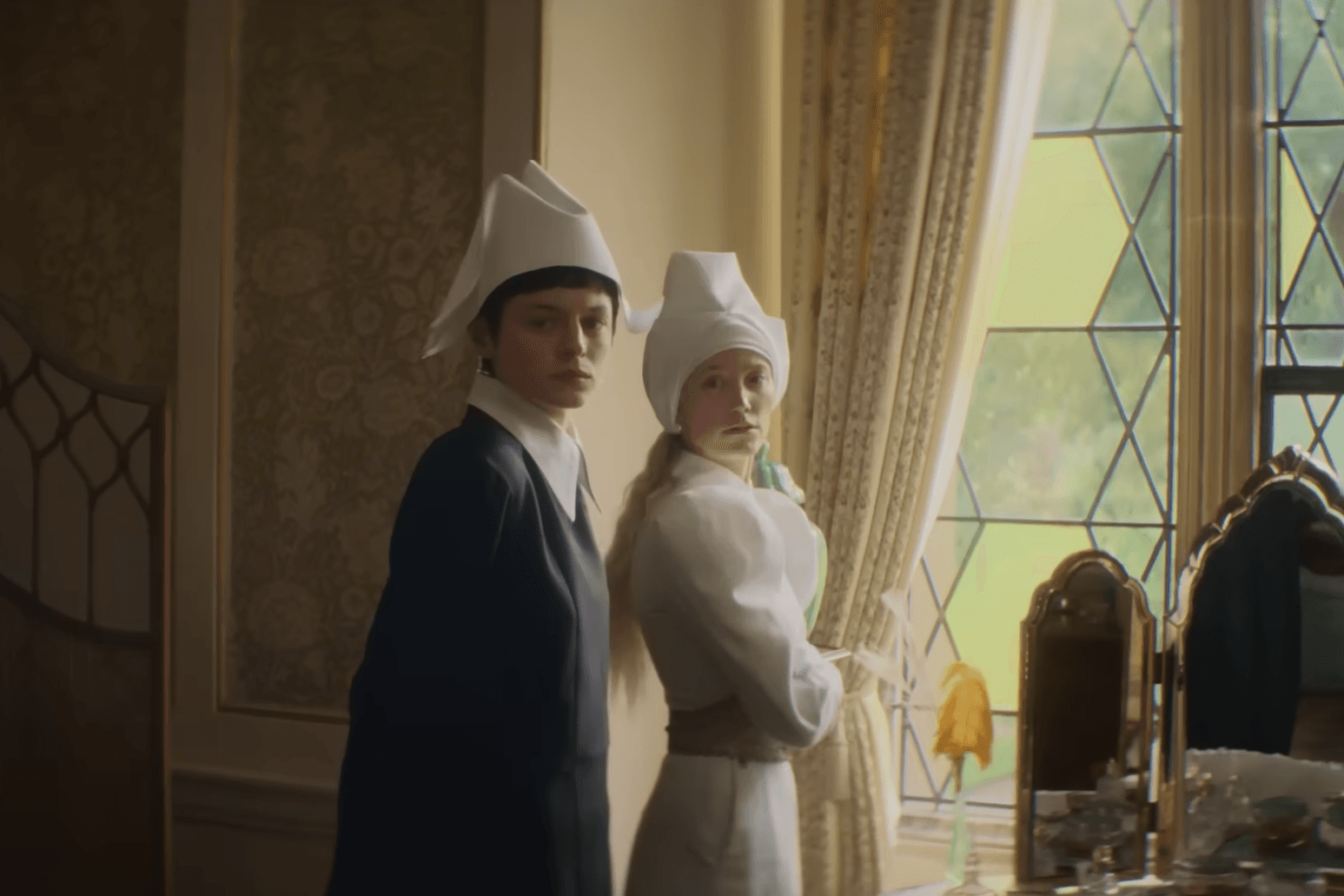 Emma Corrin and Maika Monroe in "100 Nights of Hero".