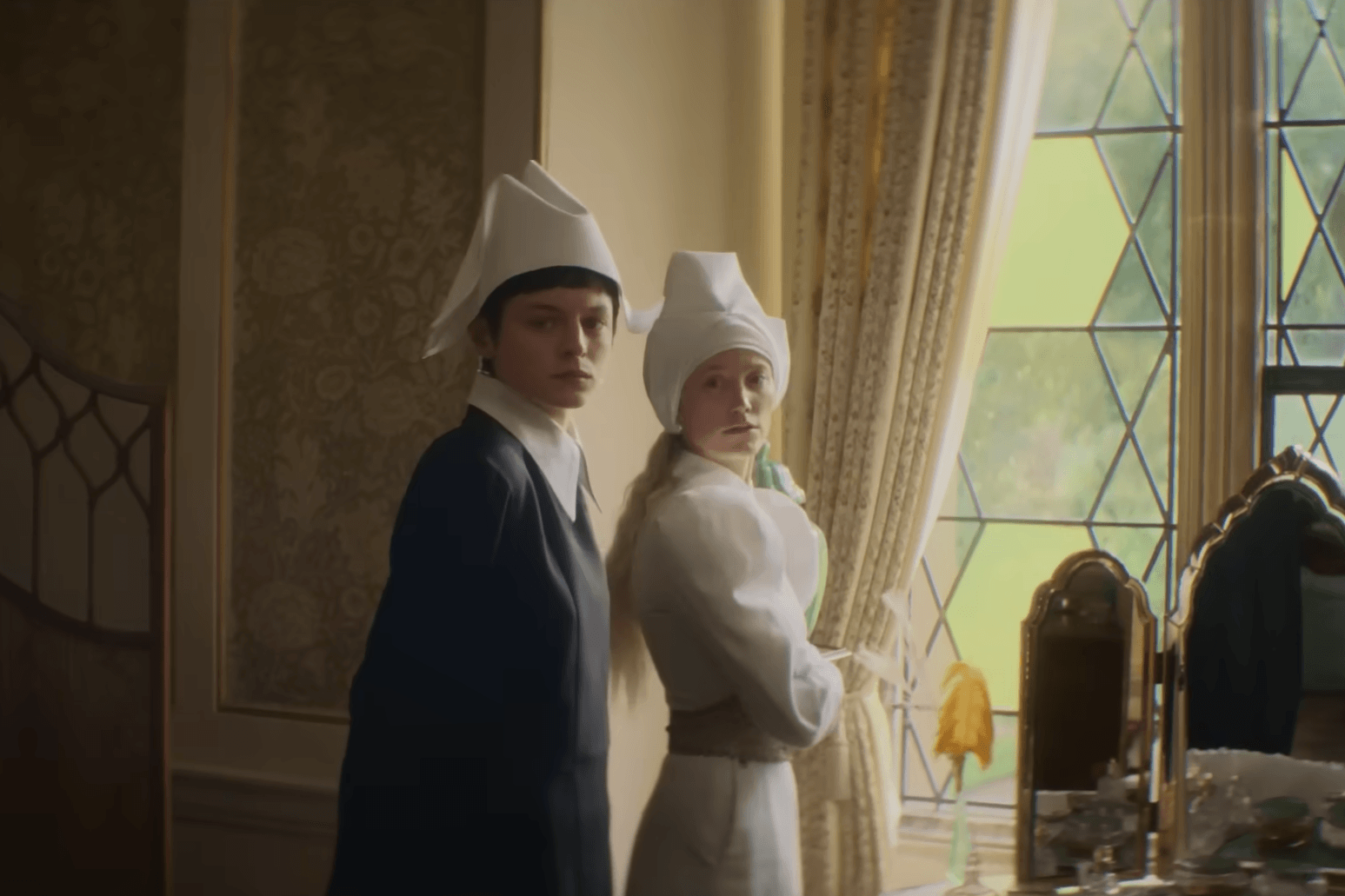 Emma Corrin and Maika Monroe in "100 Nights of Hero".