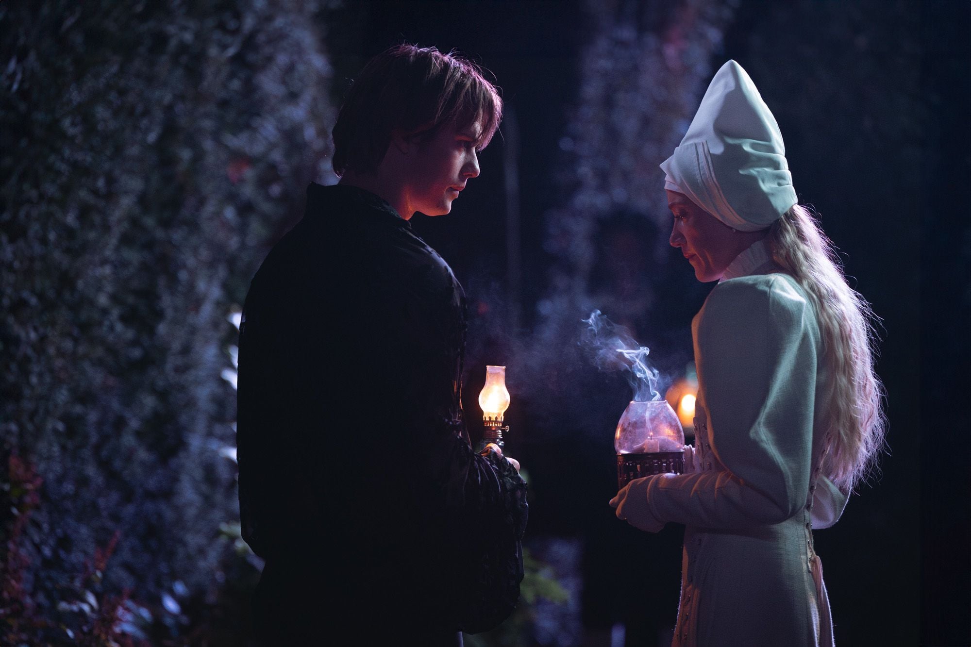 Nicholas Galitzine and Maika Monroe meeting outside in "100 Nights of Hero."