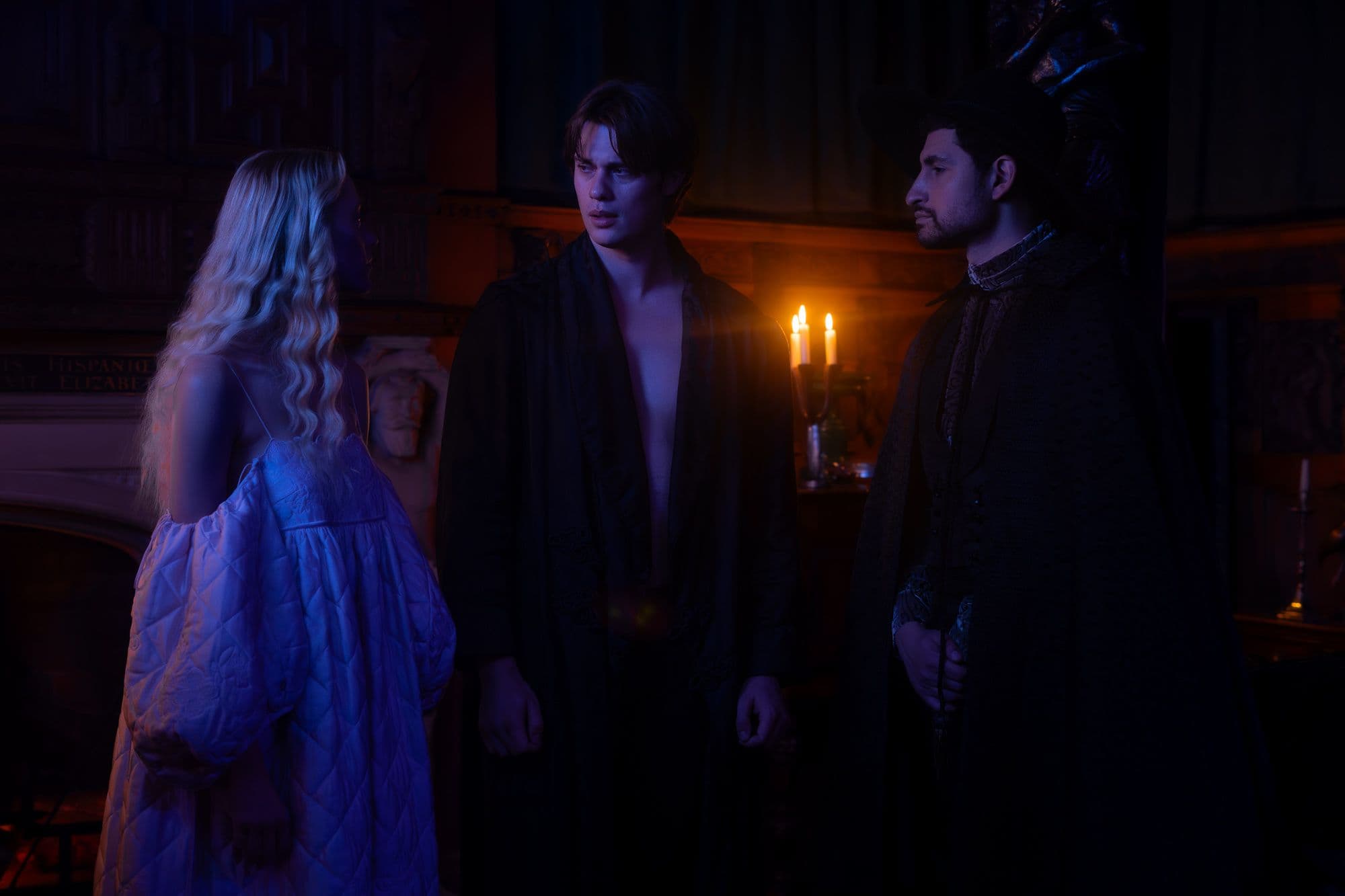 Maika Monroe, Nicholas Galitzine, and Amir El-Masry convene in candlelight in "100 Nights of Hero."
