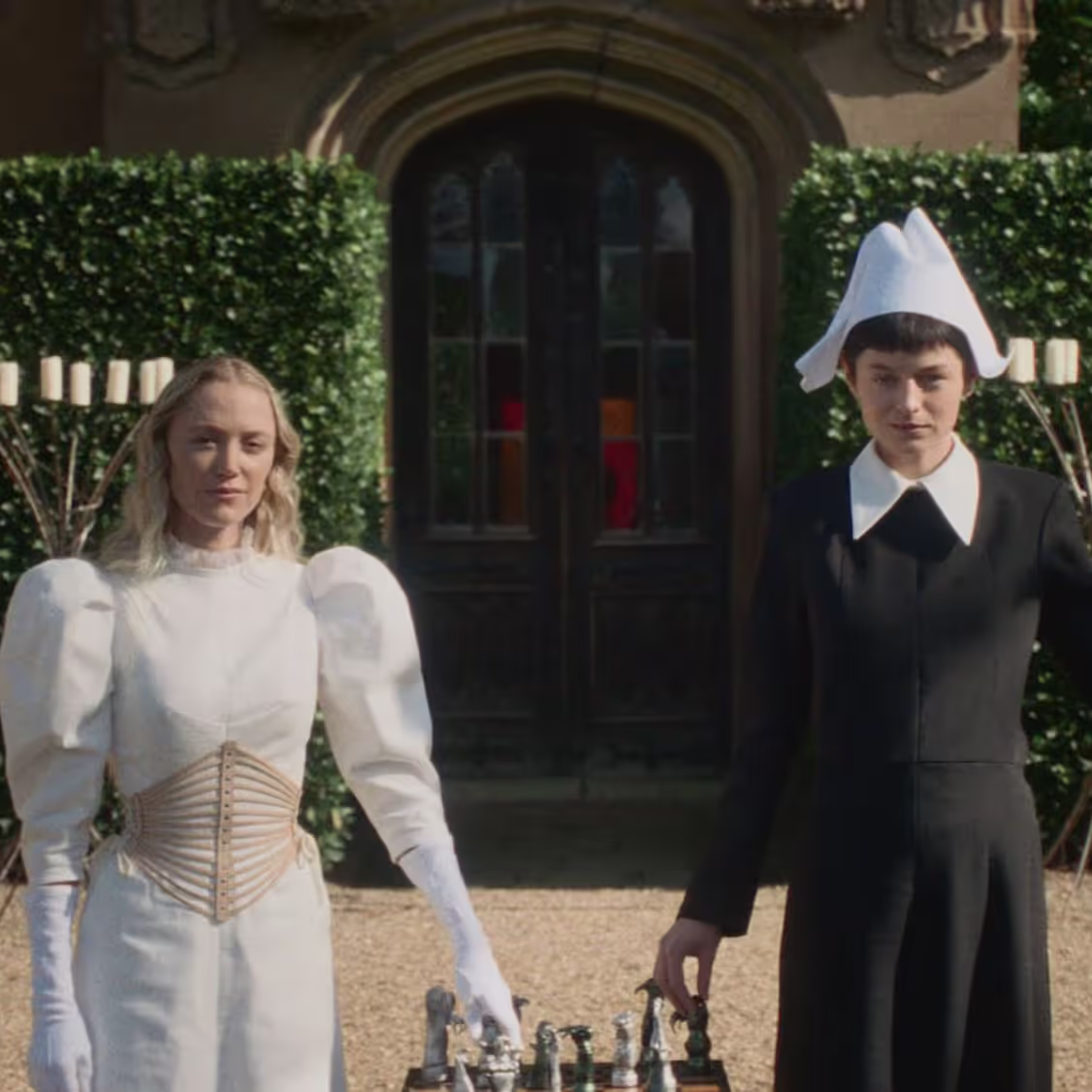 Maika Monroe and Emma Corrin in "100 Nights of Hero".