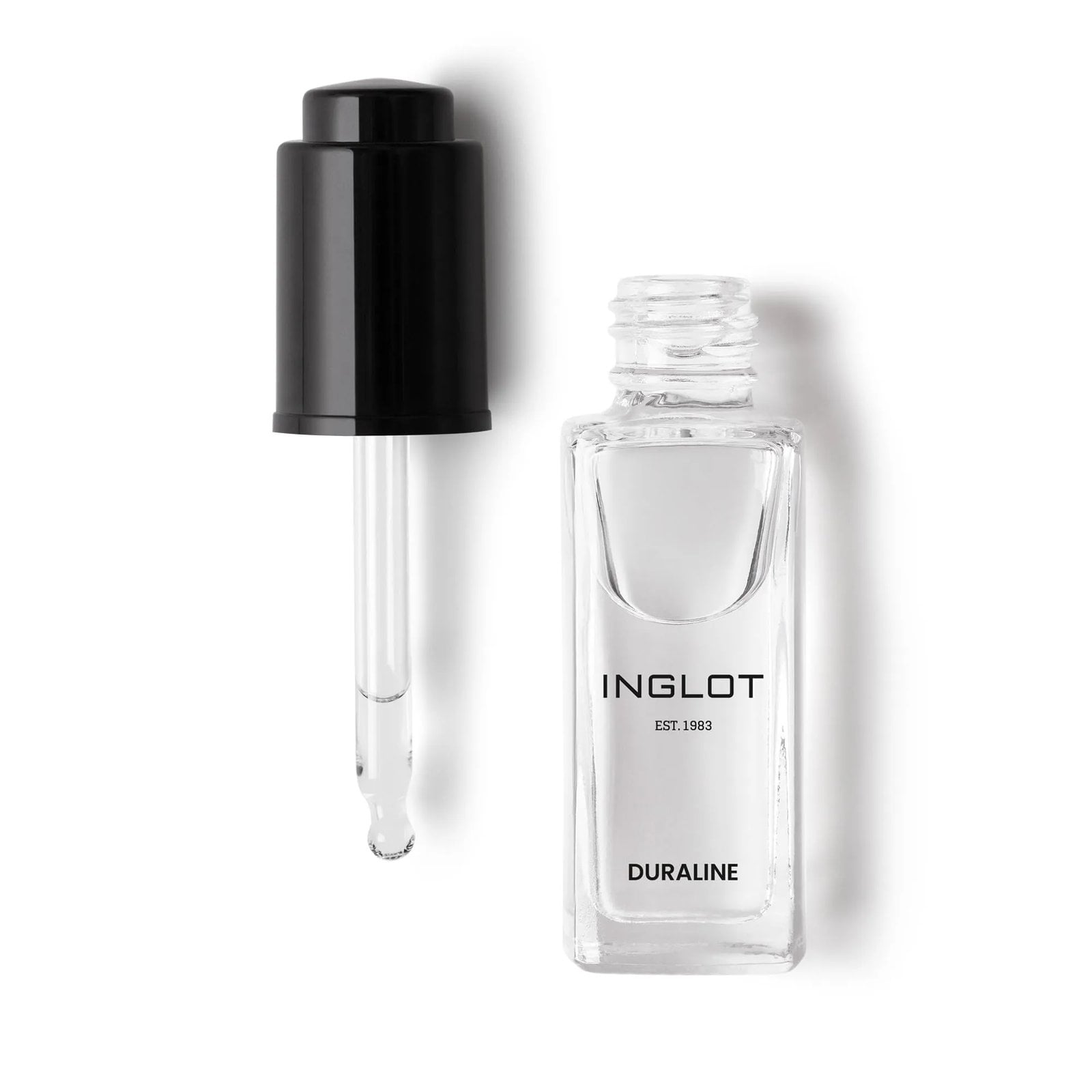 A clear vial of clear makeup liquid against a white background
