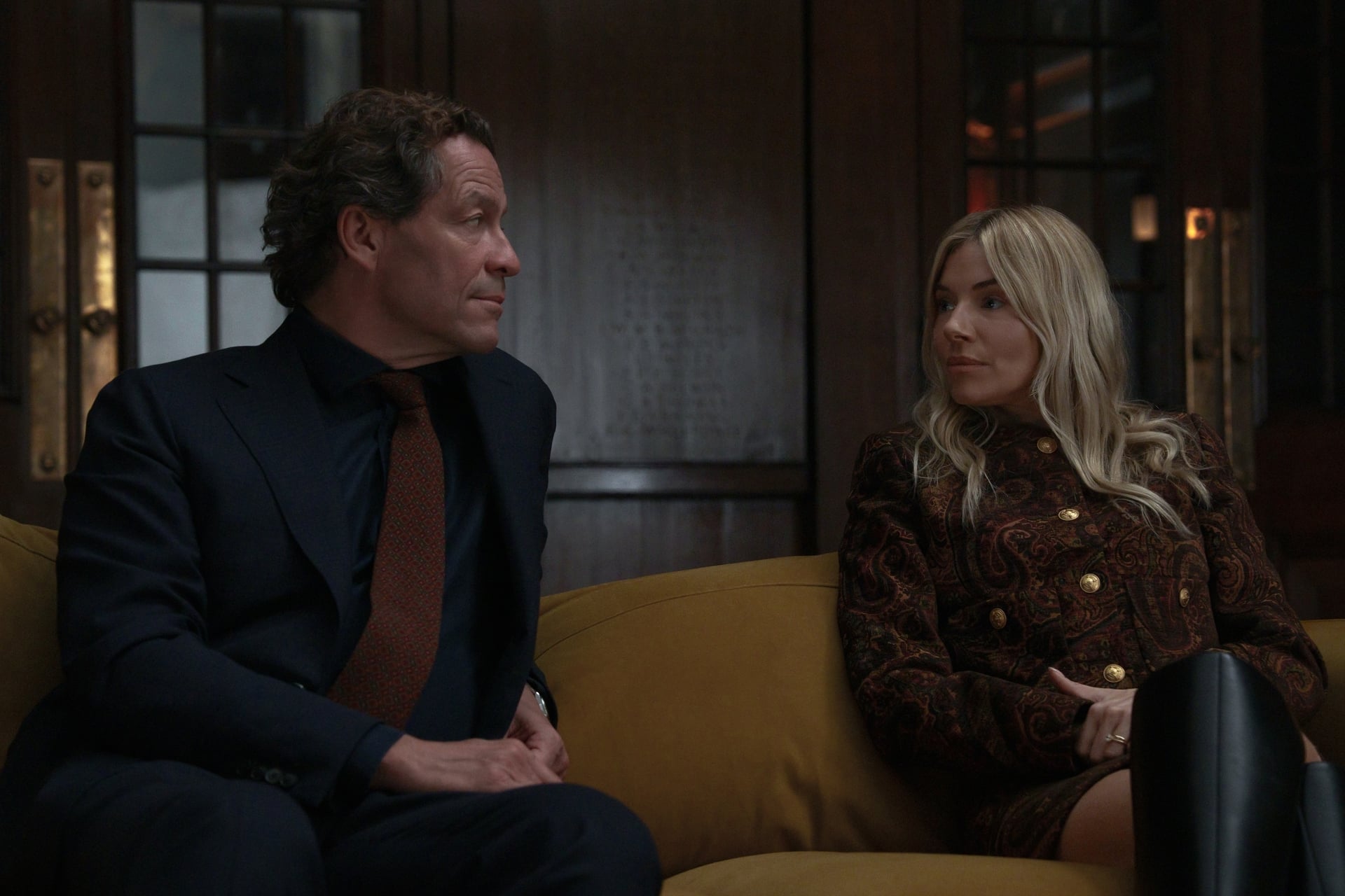 Dominic West and Sienna Miller in "War."