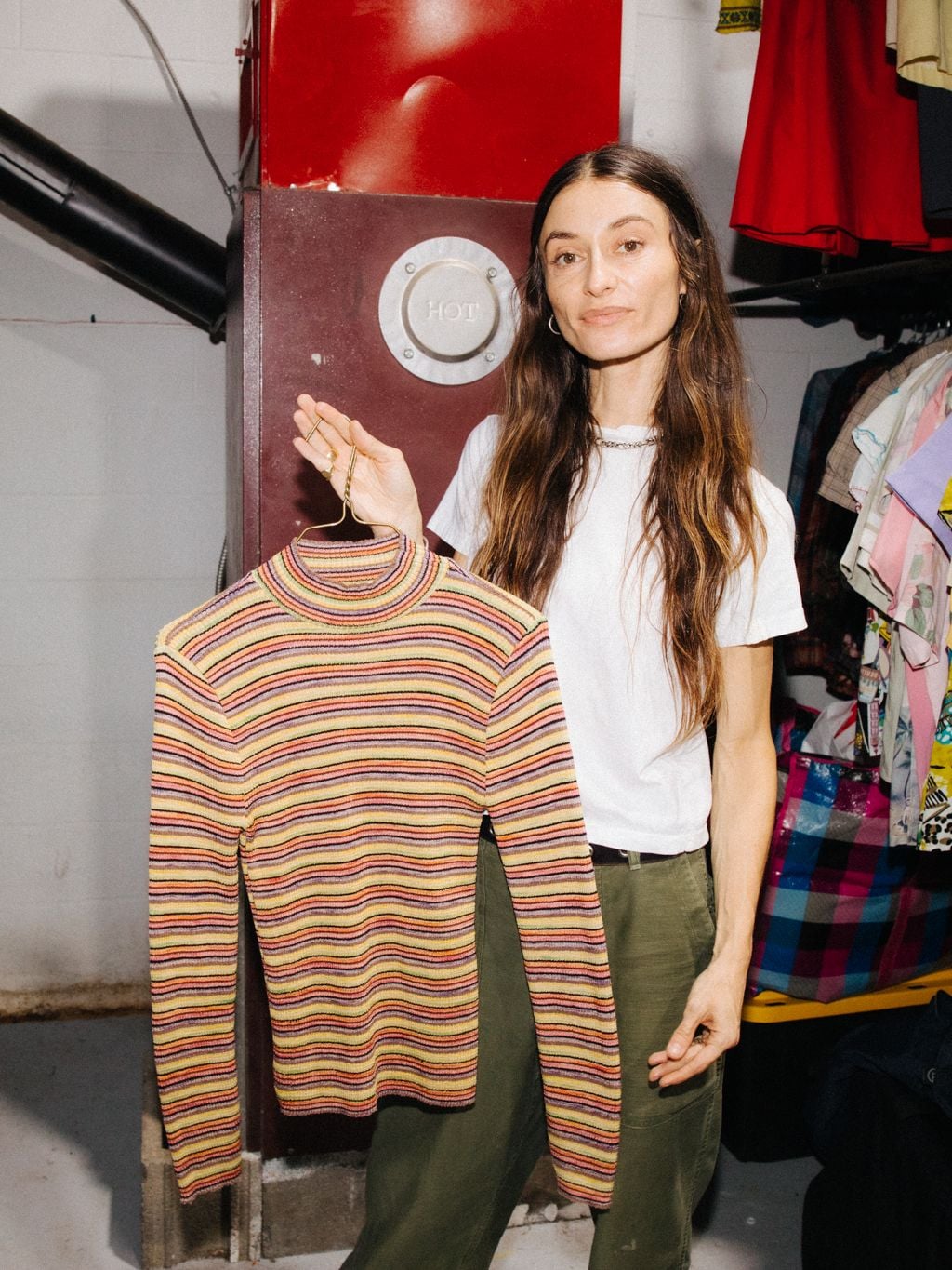 Danabassis with the sweater she used for a younger version of Greta Lee's character in "Past Lives".