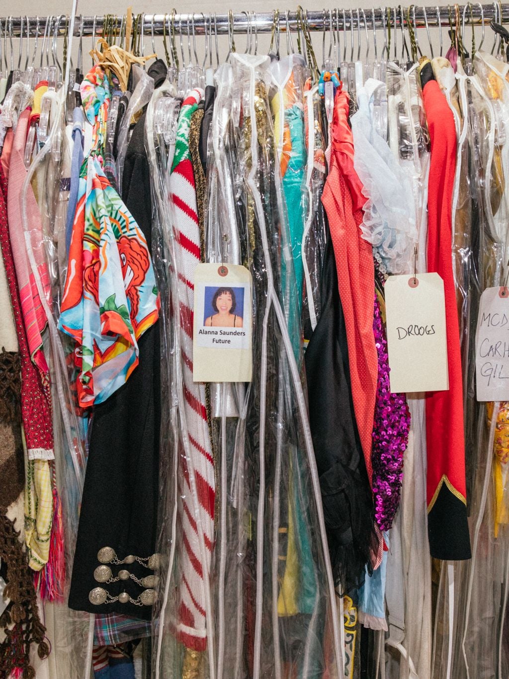 Rails and rails of clothing line the inside of Barracuda.