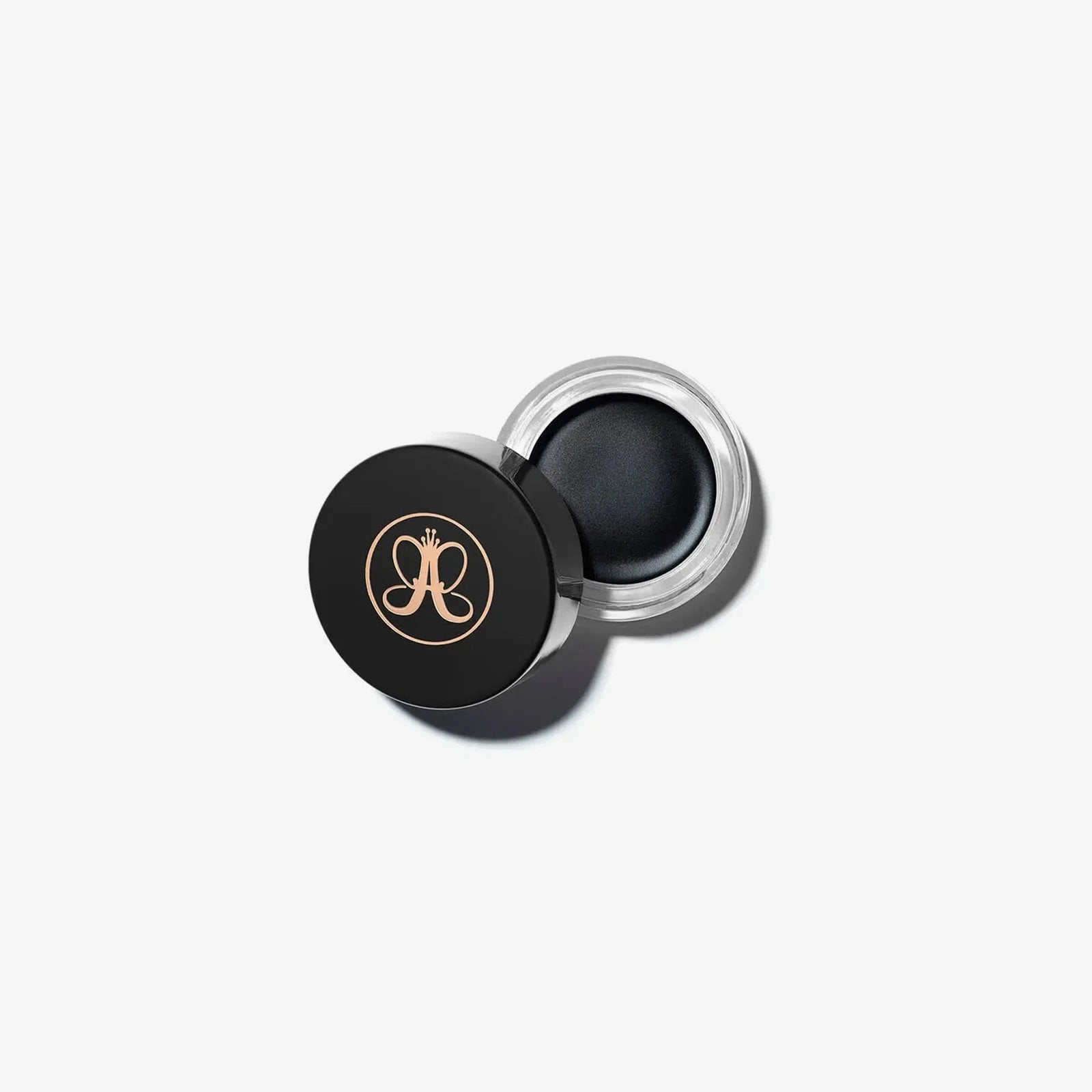 An open pot of Anastasia Beverly Hills Waterproof cream eyeliner in black, against a white background