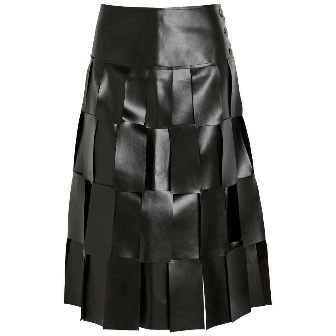 The A.W.A.K.E. Mode Laser-cut faux leather midi skirt against a white background