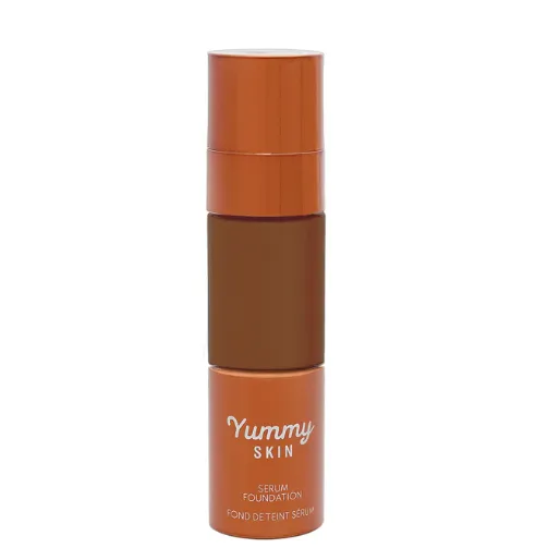 A tube of the Danessa Myricks serum foundation a dark shade against a white background