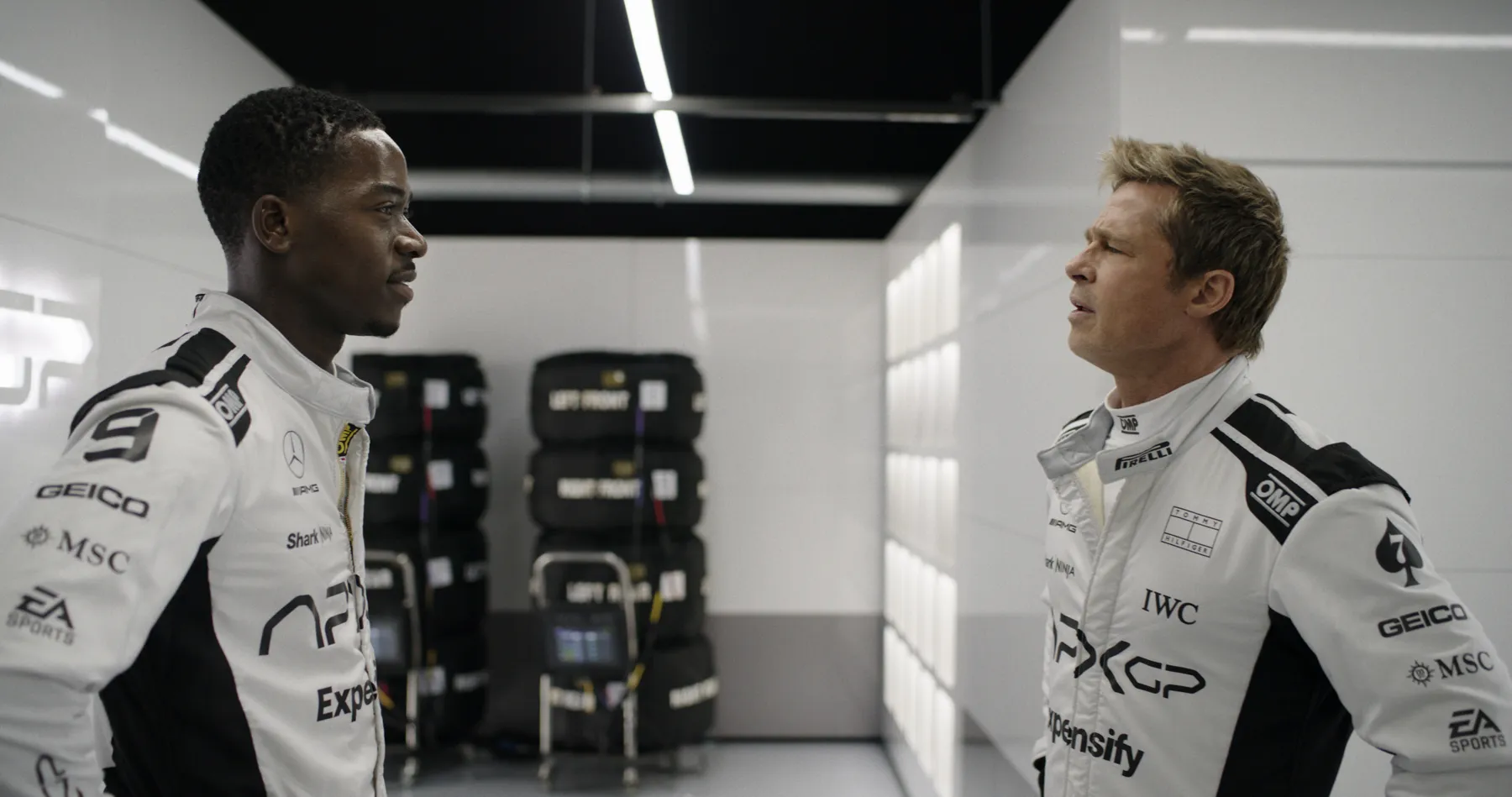 Damson Idris as Joshua Pearce and Brad Pitt as Sonny Hayes in Apple Original Films’ "F1 The Movie."