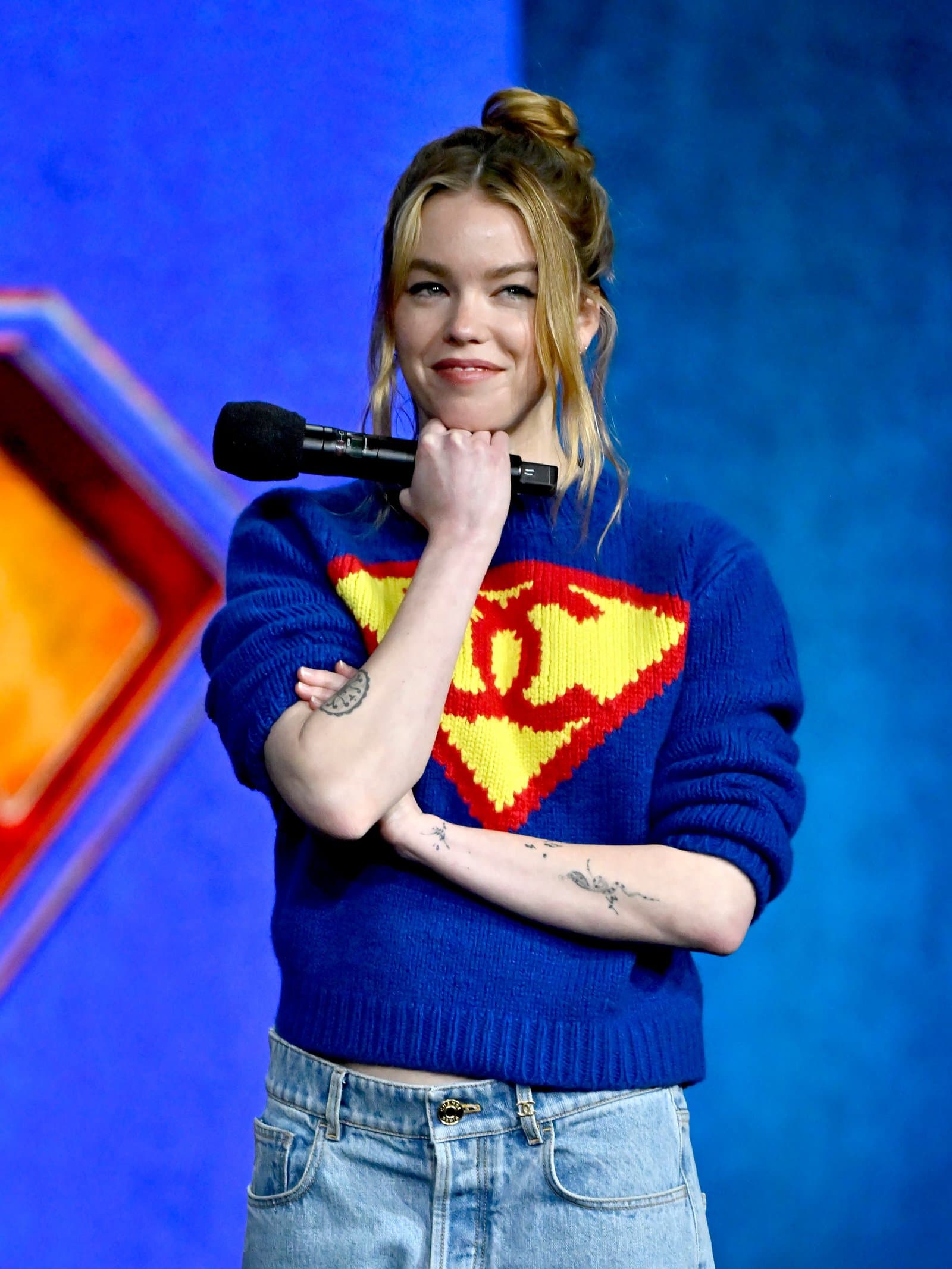 Milly Alcock wearing the Chanel cashmere sweatshirt.