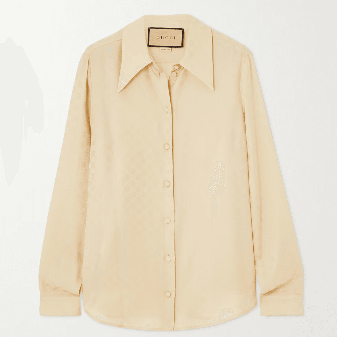 A Gucci silk-jacquard shirt in a cream color against a gray background
