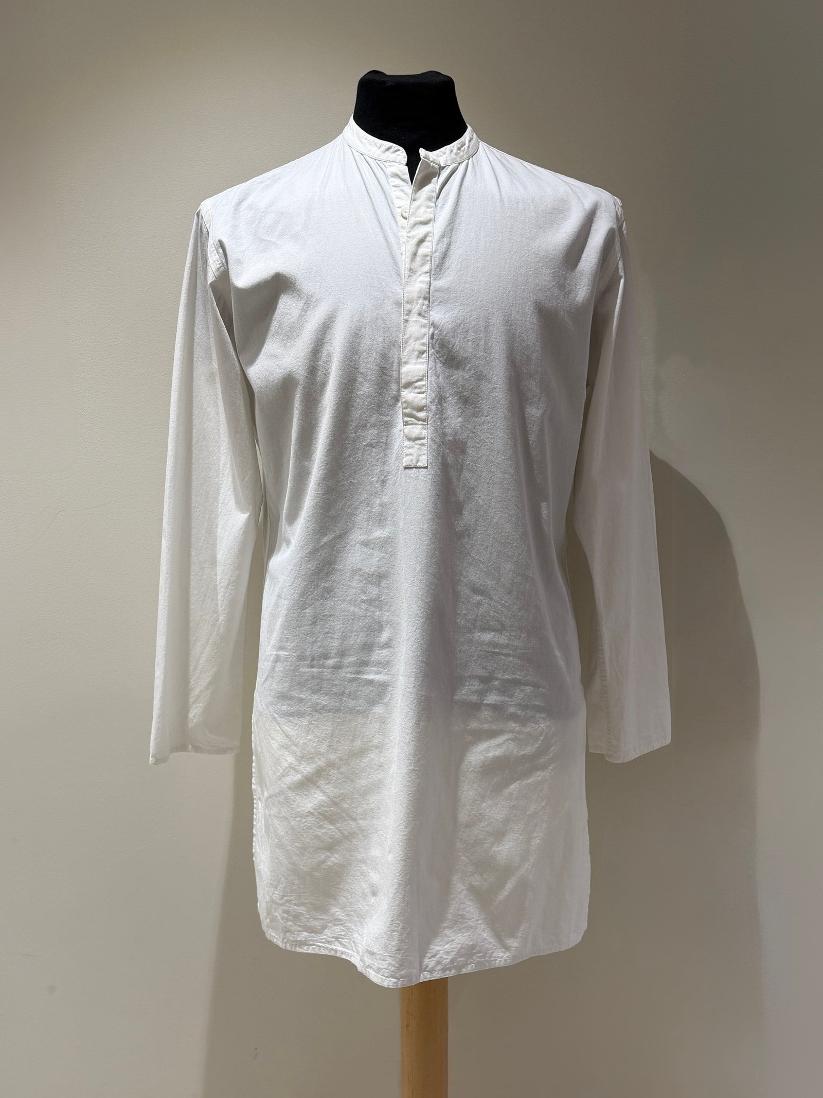 Hamlet's kurta begins bright white.