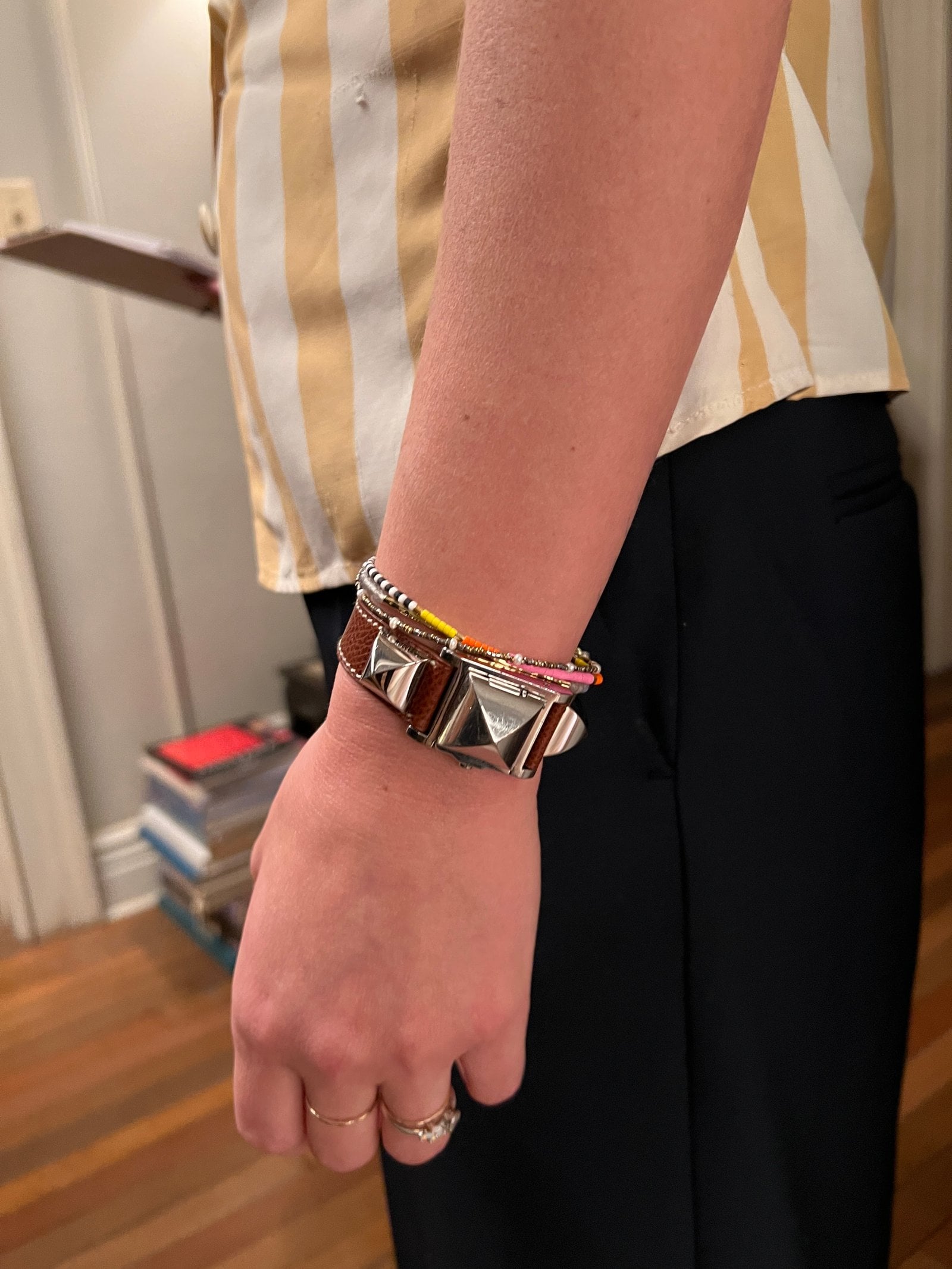 Olivia Wilde wearing Phillips' vintage Hermès Medor watch.