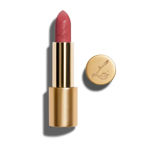 A medium rose pink lipstick in a gold tube against a white background