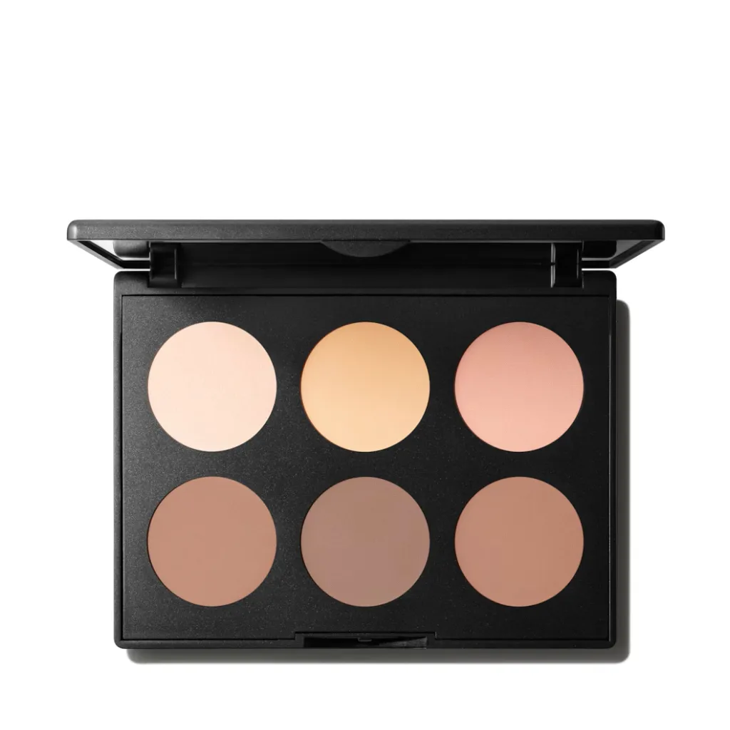 An open MAC Studio Fix Sculpt and Shape Contour Palette in Light/Medium with six round powders against a white background.