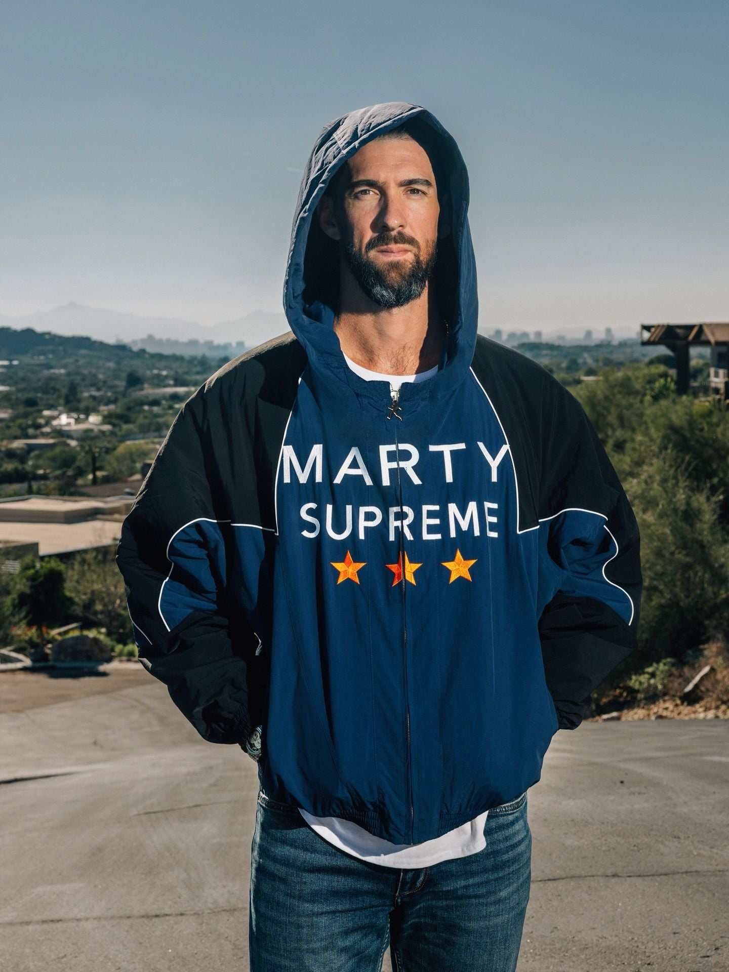 Michael Phelps in the "Marty Supreme" Nahmias windbreaker.