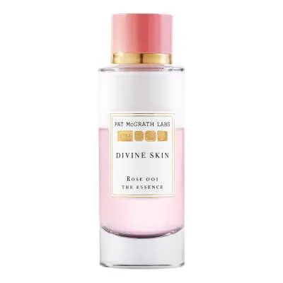 A tall bottle of facial essence against a white background