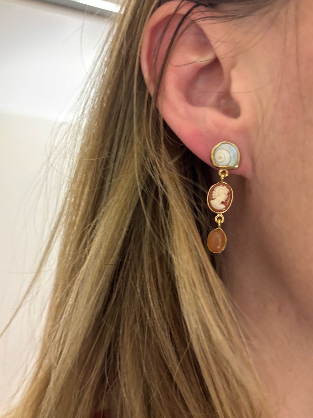 Angela's earrings in "The Invite."