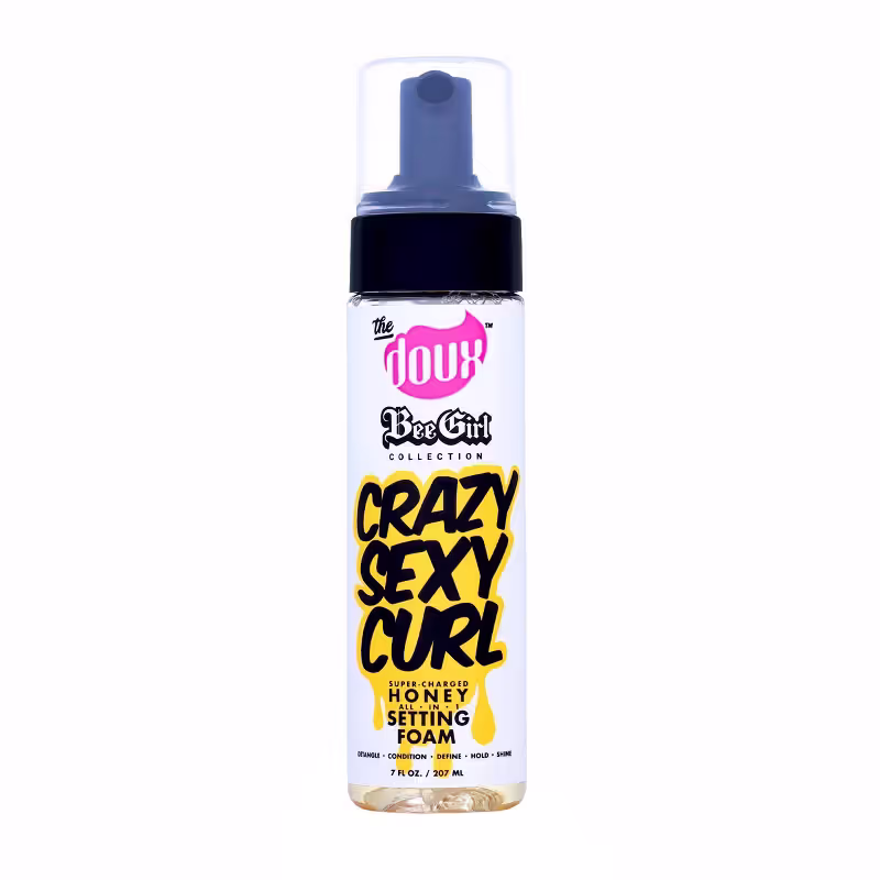 A bottle of The Doux Crazy Sexy Curl Setting Foam