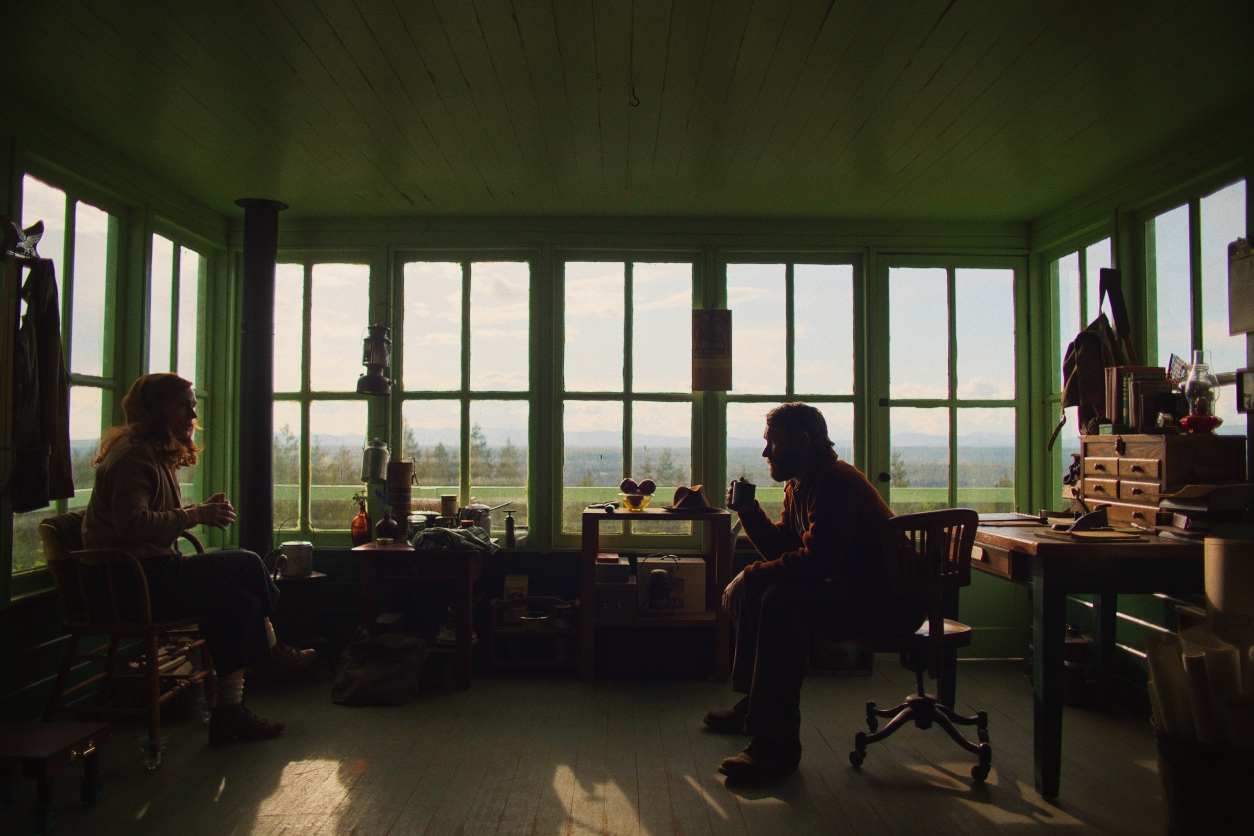 Claire (Kerry Condon) and Granier (Joel Edgerton) in the fire tower.