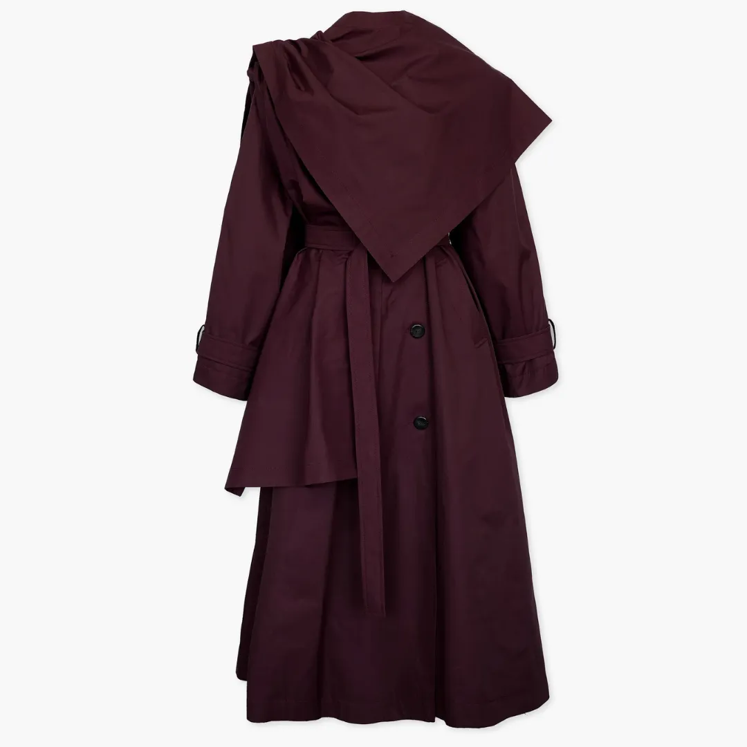 The Vem Vèt Amsterdam trench coat in burgundy against a white background