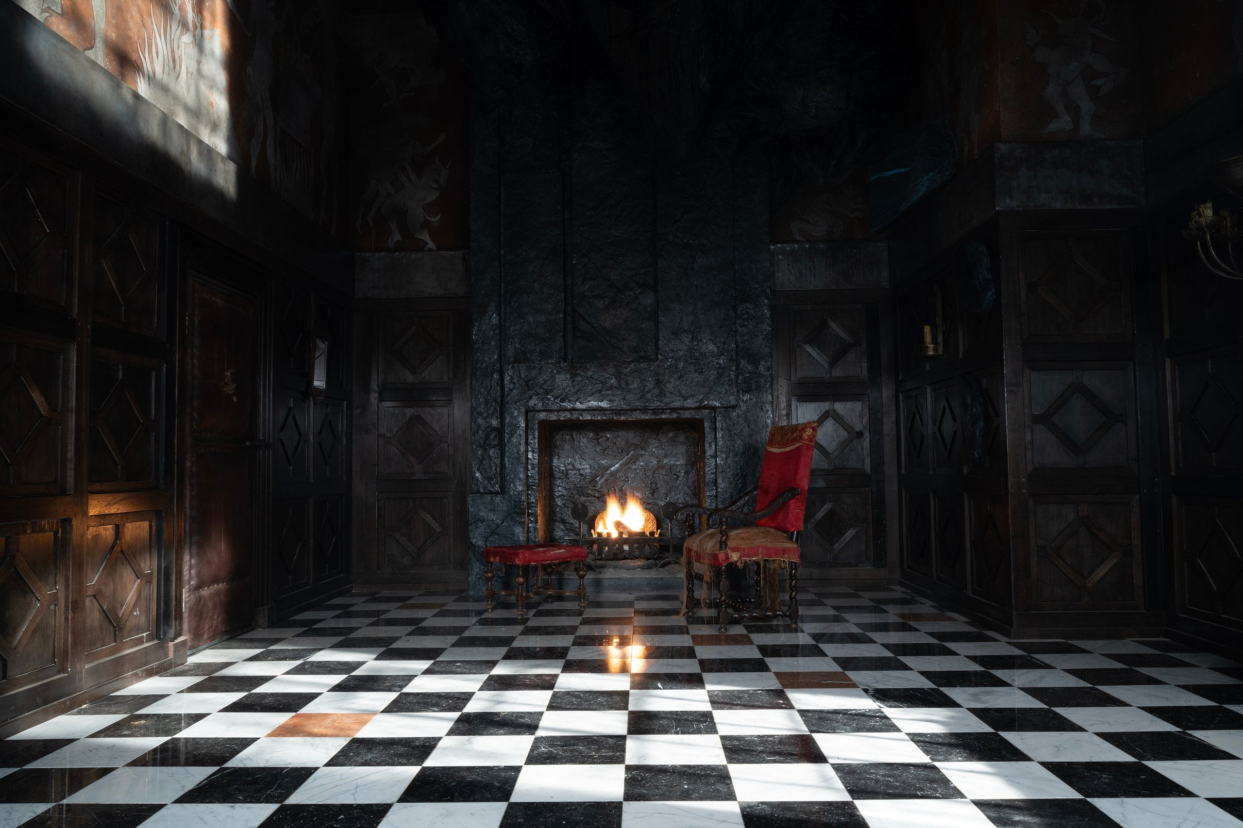 Inside the gloomy, shadowy home.