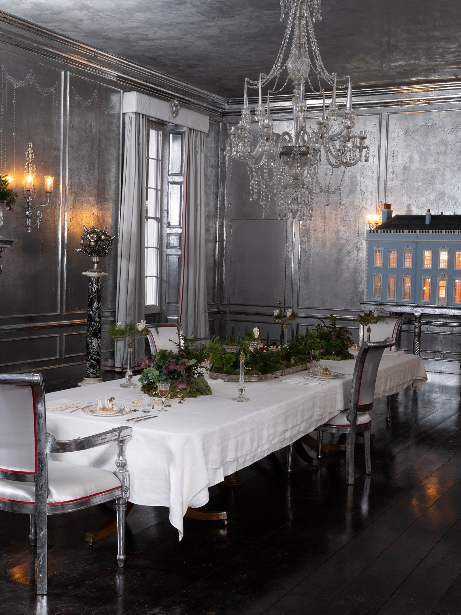 The dining room of Thrushcross Grange—featuring the replica doll's house.