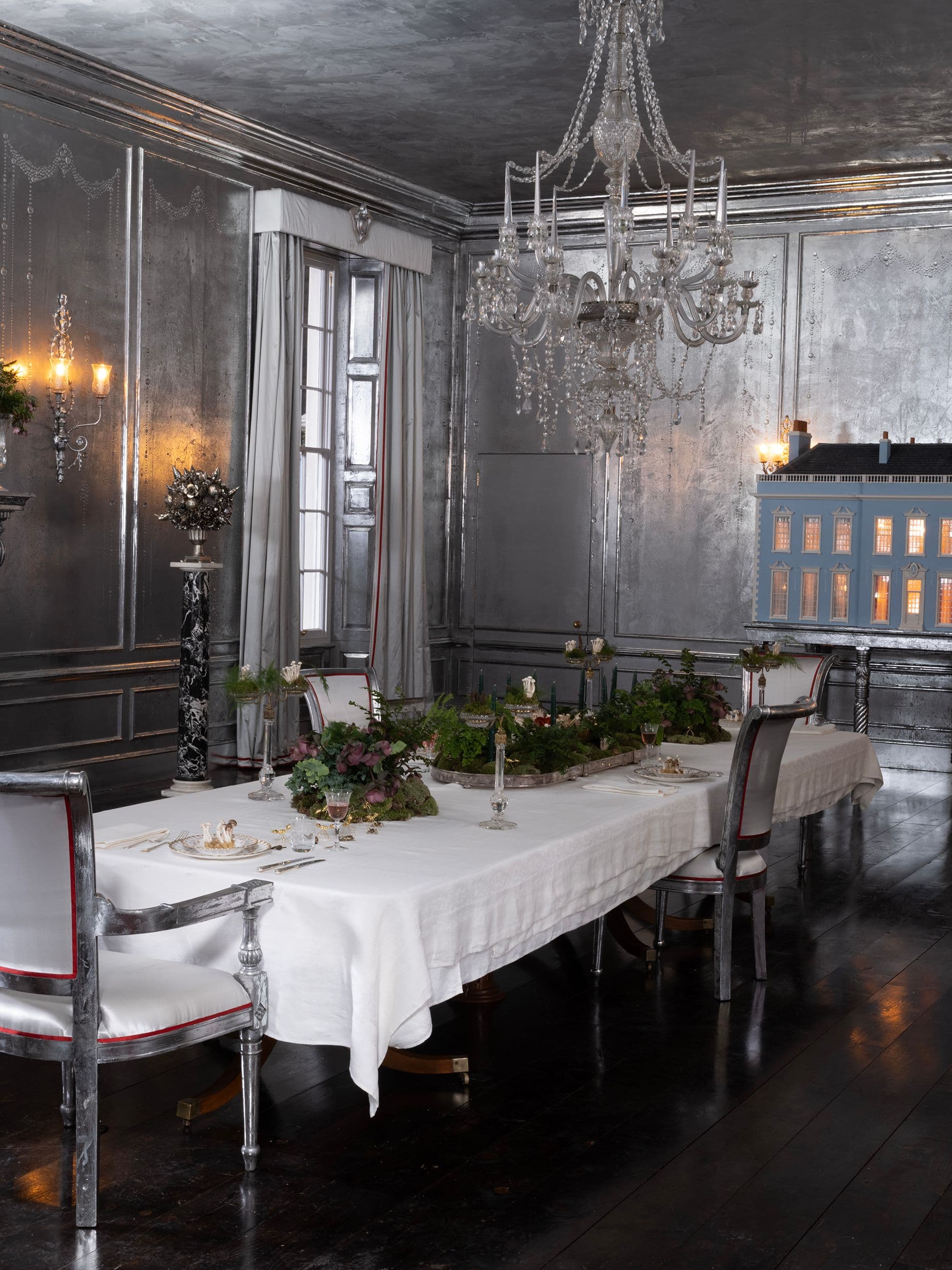 The dining room of Thrushcross Grange—featuring the replica doll's house.