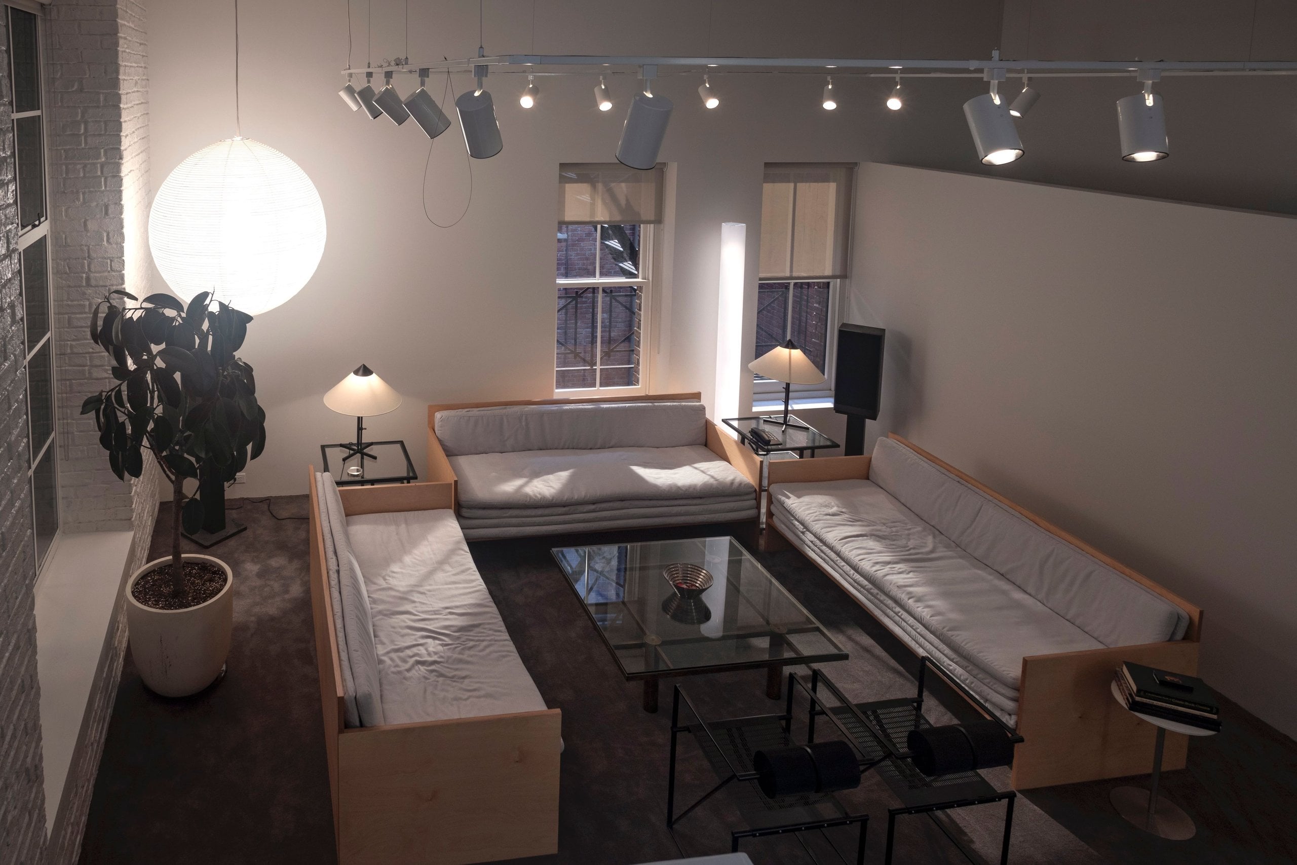 To design the living space production designer Alex DiGerlando looked to sultry, stylized depictions of loft living in the 2000s.