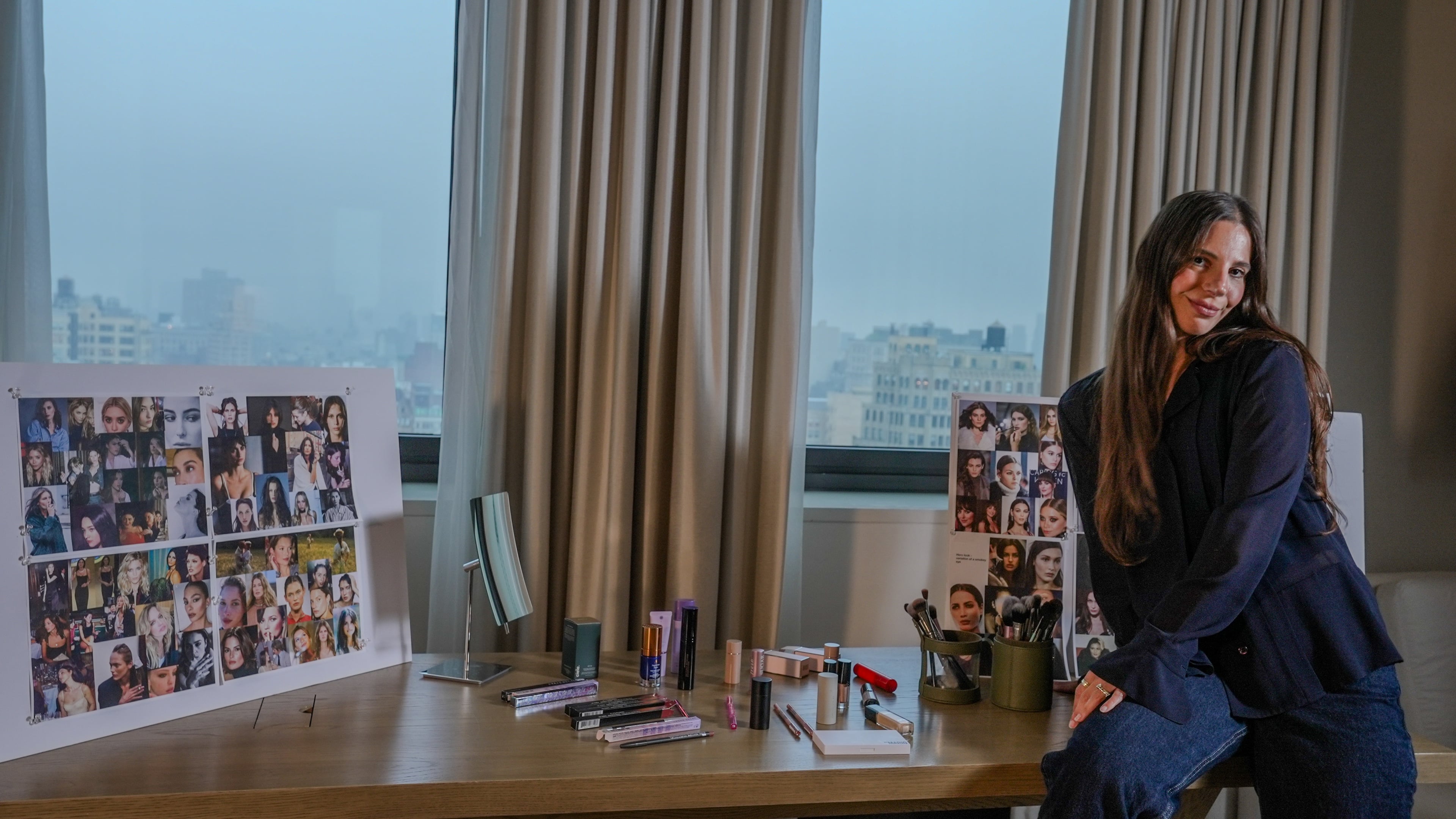 Emma Strachman in front of her mood boards for Dakota Johnson.