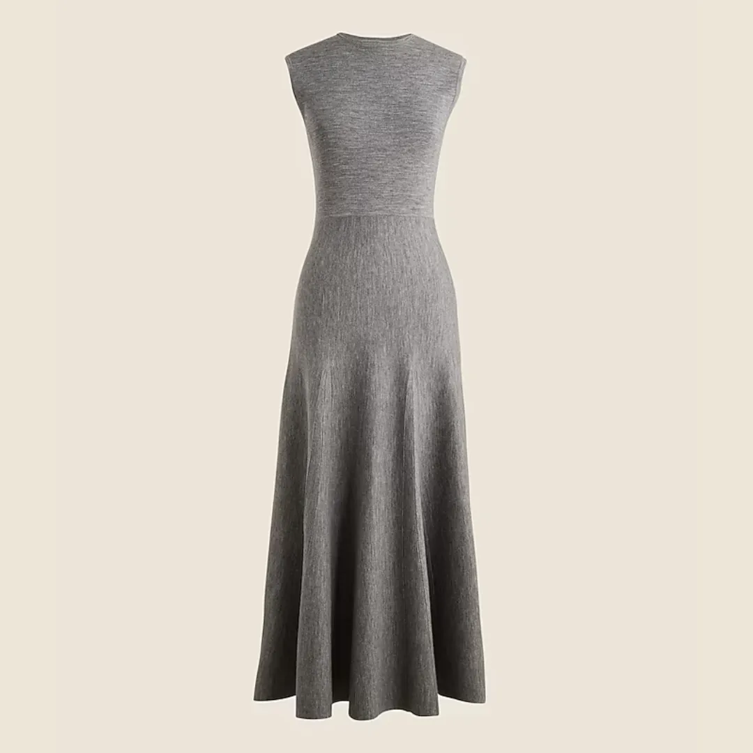 The J.Crew Merino wool midi dress in a soft gray against a cream background