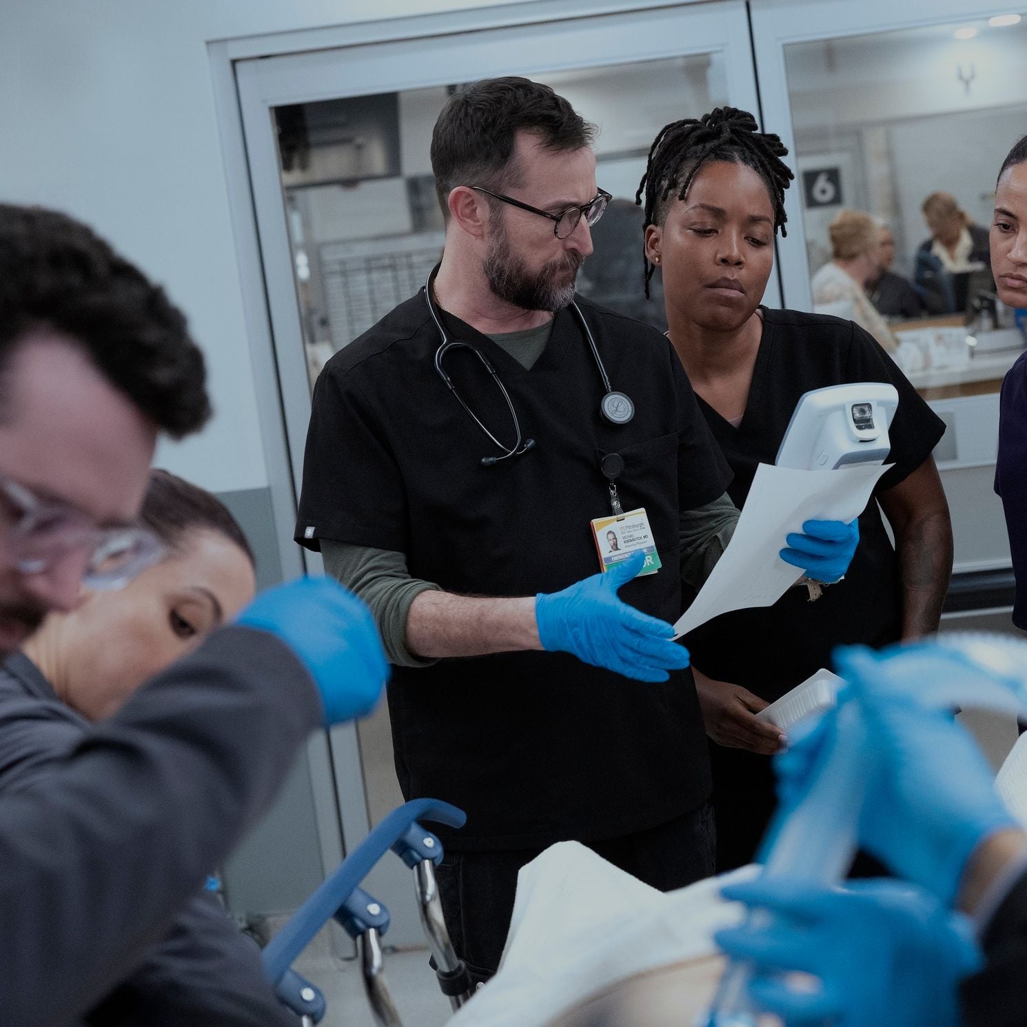 Noah Wyle, Ayesha Harris, and Alexandra Metz in "The Pitt" season two.