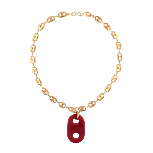 18-Karat gold plated brass mariner link chain with red glass charm hanging on it