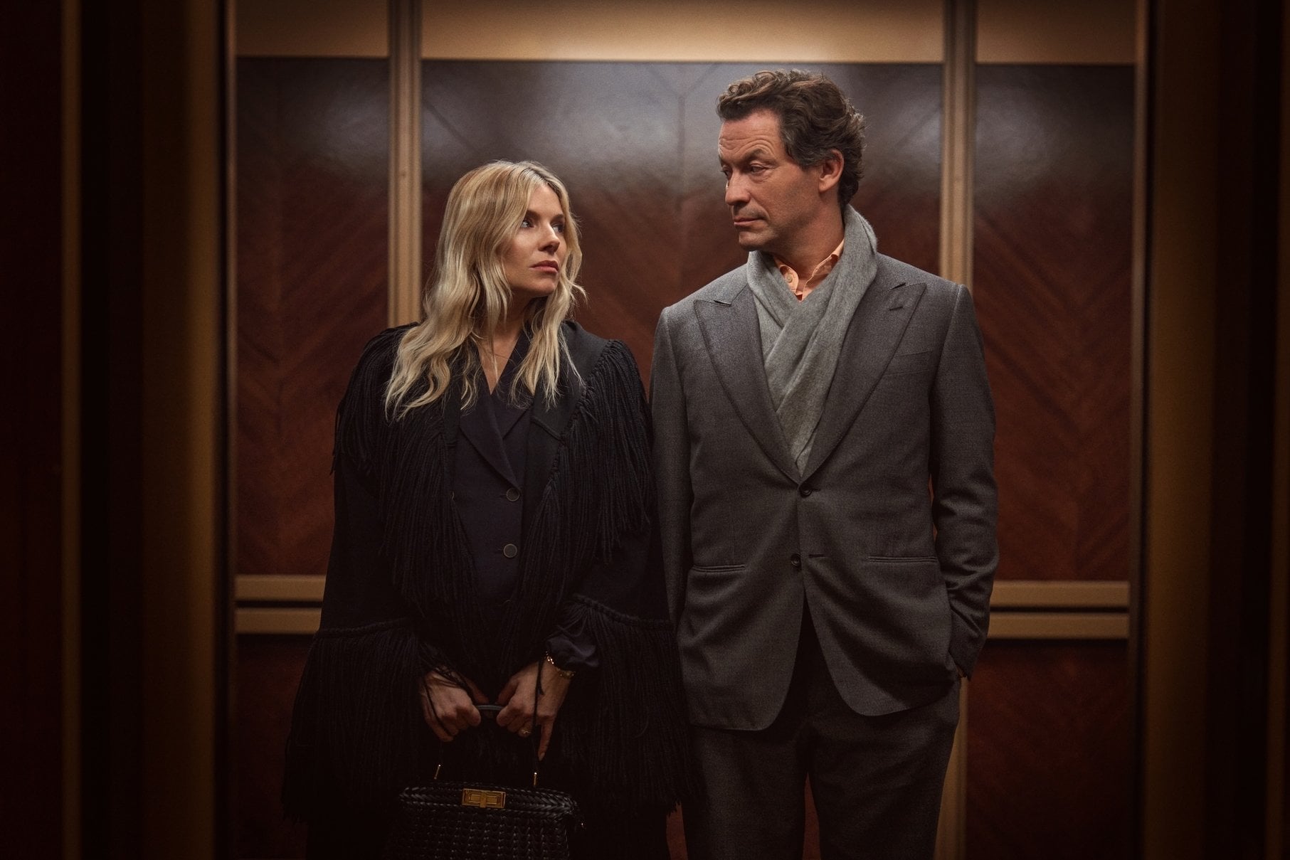 Sienna Miller and Dominic West in "War."