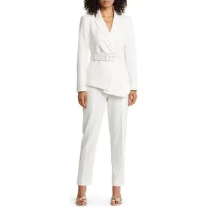 A model wears the Tahari Peak Lapel Belted Blazer & Pants Set in white