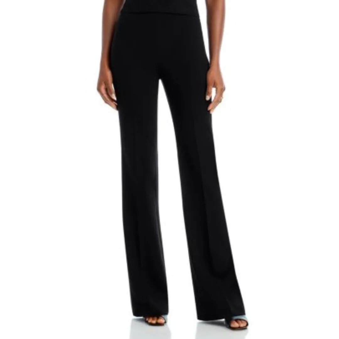 The bottom half of a model wears the Theory Demitria Admiral Crepe Flared Pants in black.